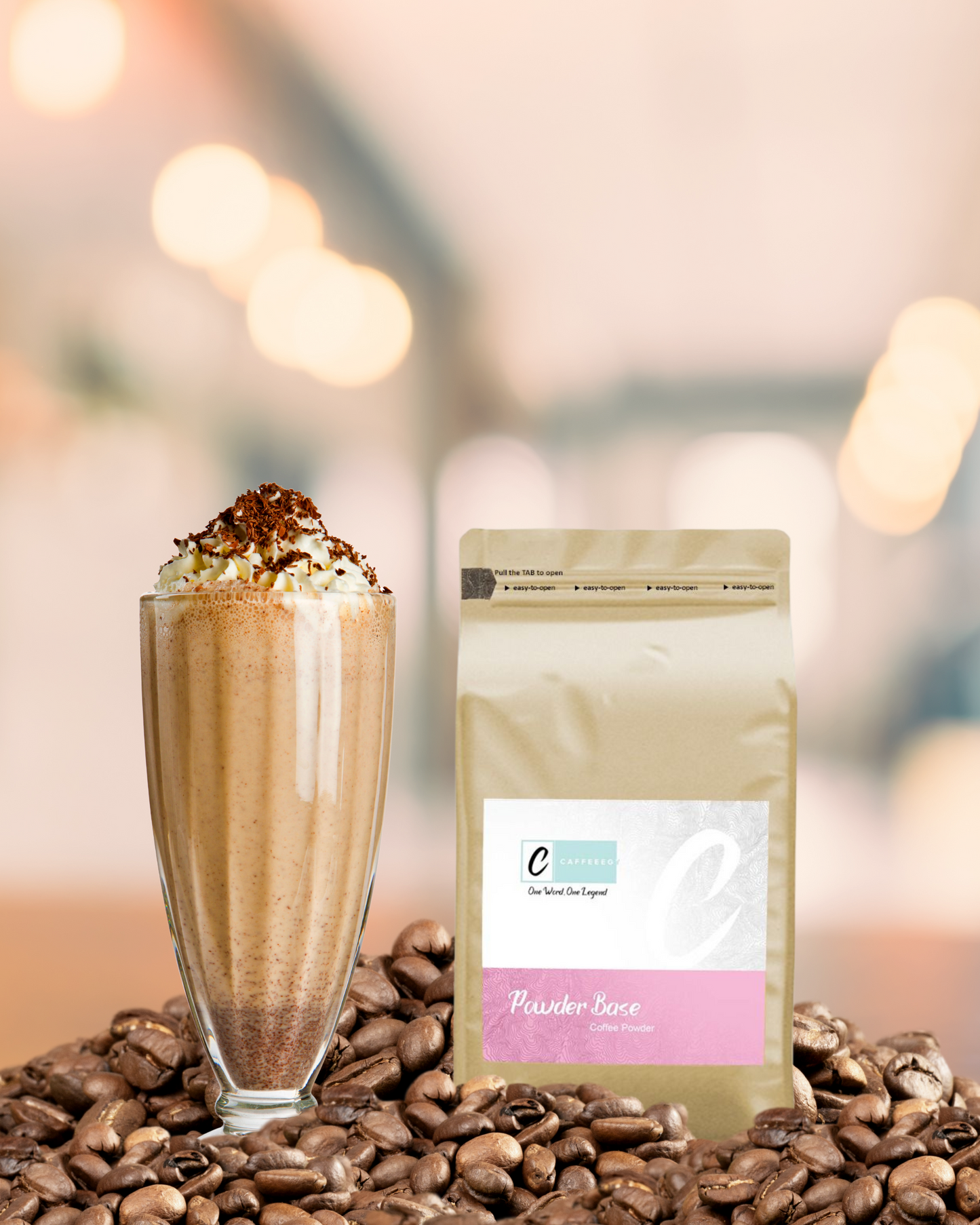 Caffeeegy.Co premium coffee powder package next to a whipped coffee drink on coffee beans
