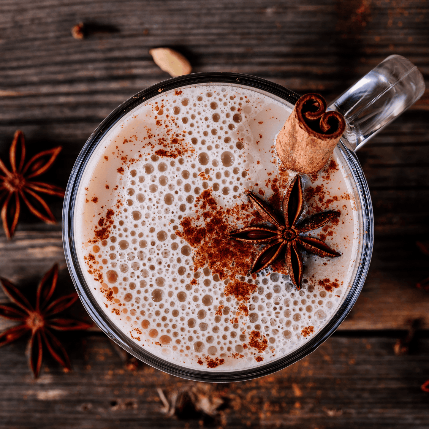 Caffeeegy.Co spice chai latte powder mixed with milk and garnished with cinnamon and star anise