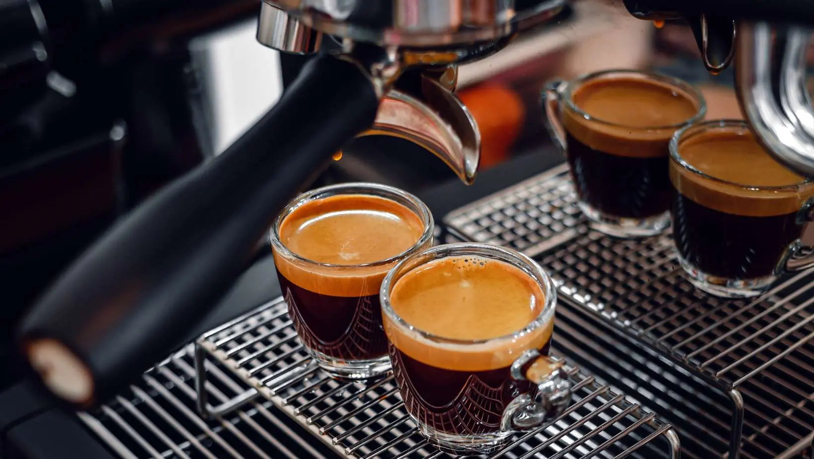 Two cups of espresso made with premium espresso coffee blend from Caffeeegy Co espresso machine