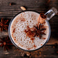 Caffeeegy.Co spice chai latte powder mixed with milk and garnished with cinnamon and star anise